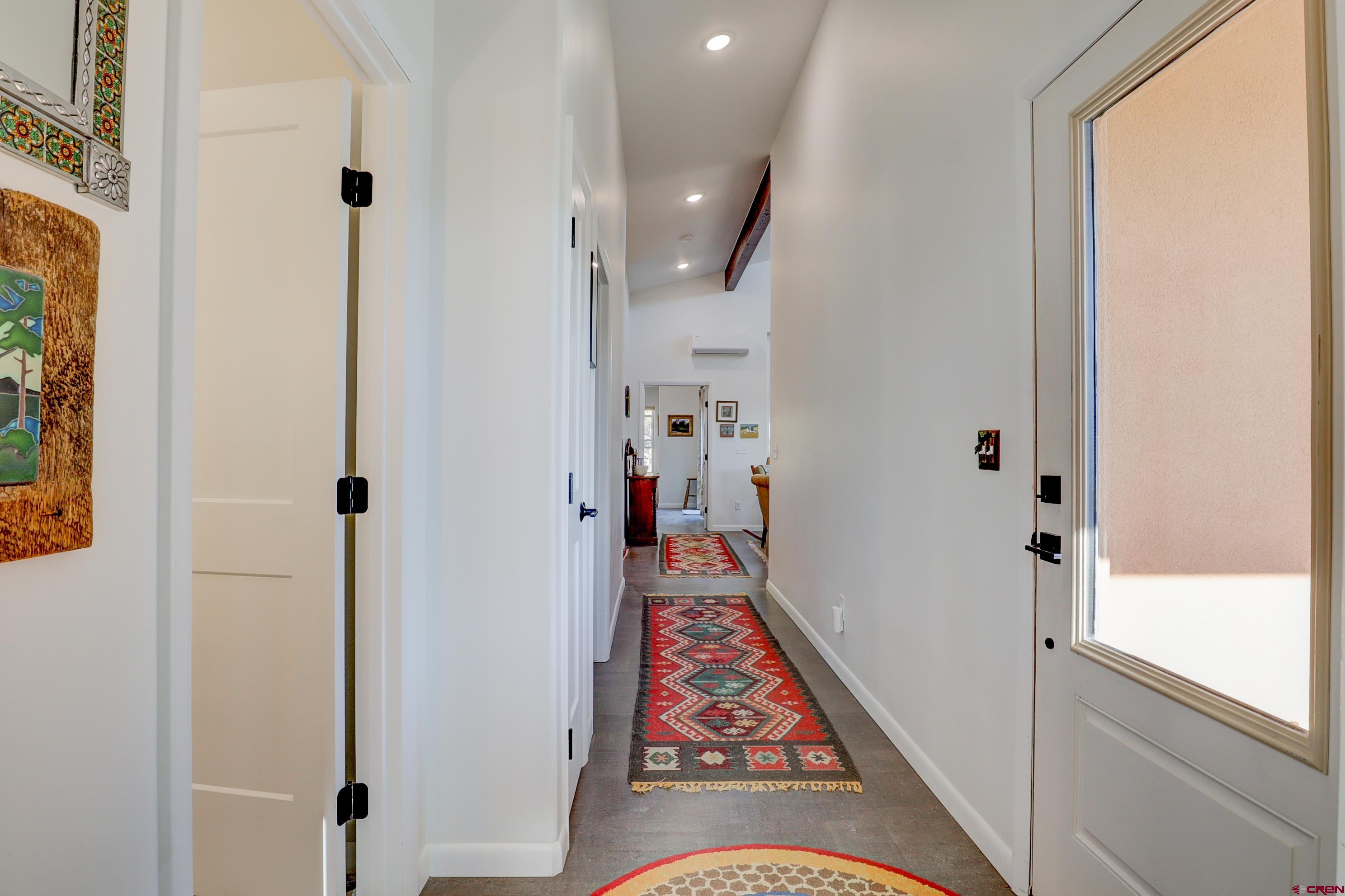 41839 Rd J.75 Mancos, CO 81328 - Photo 26 of 31 a view of a hallway view with floor to ceiling window and entryway