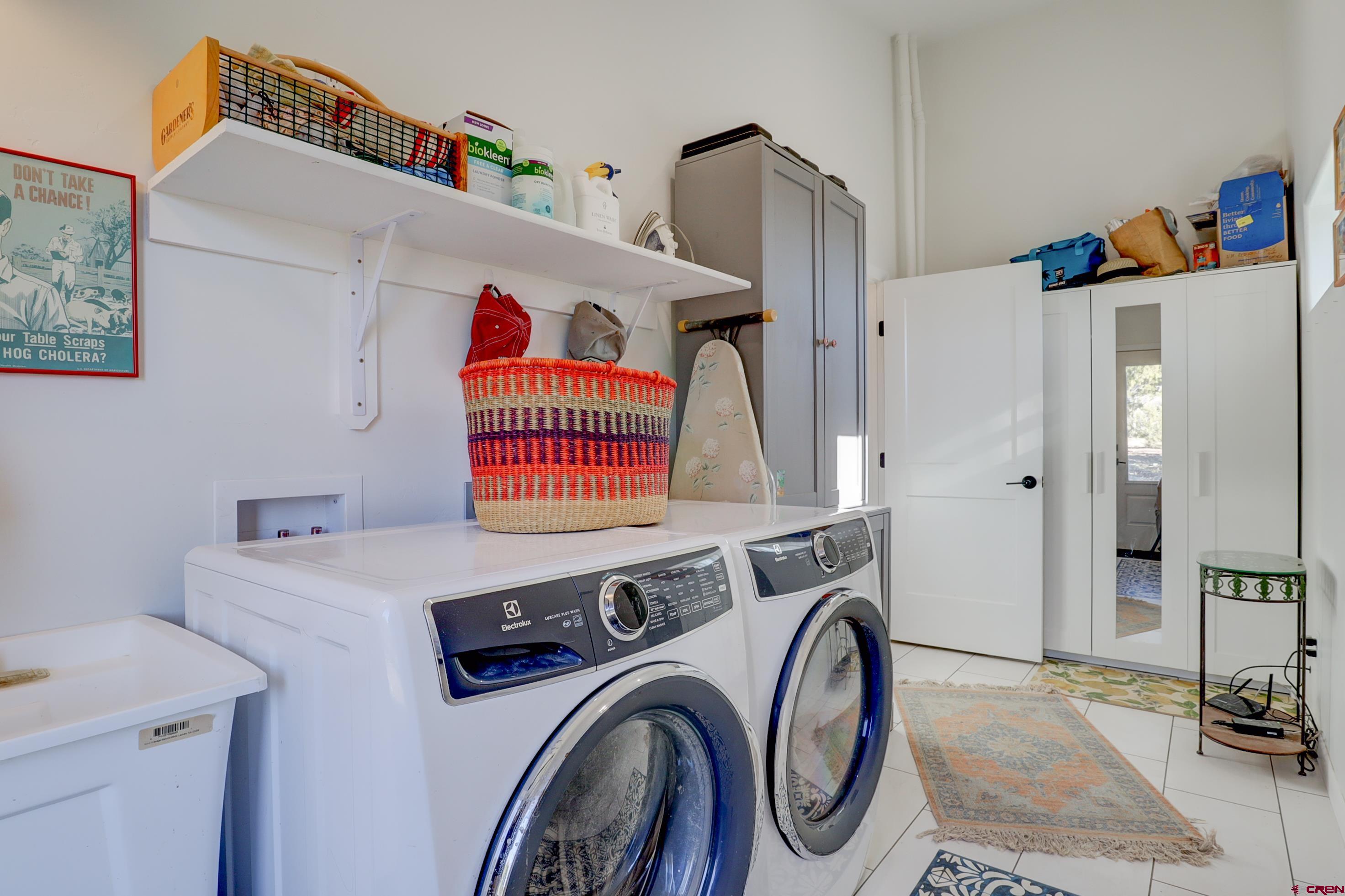 41839 Rd J.75 Mancos, CO 81328 - Photo 28 of 31 a utility room with dryer and washer