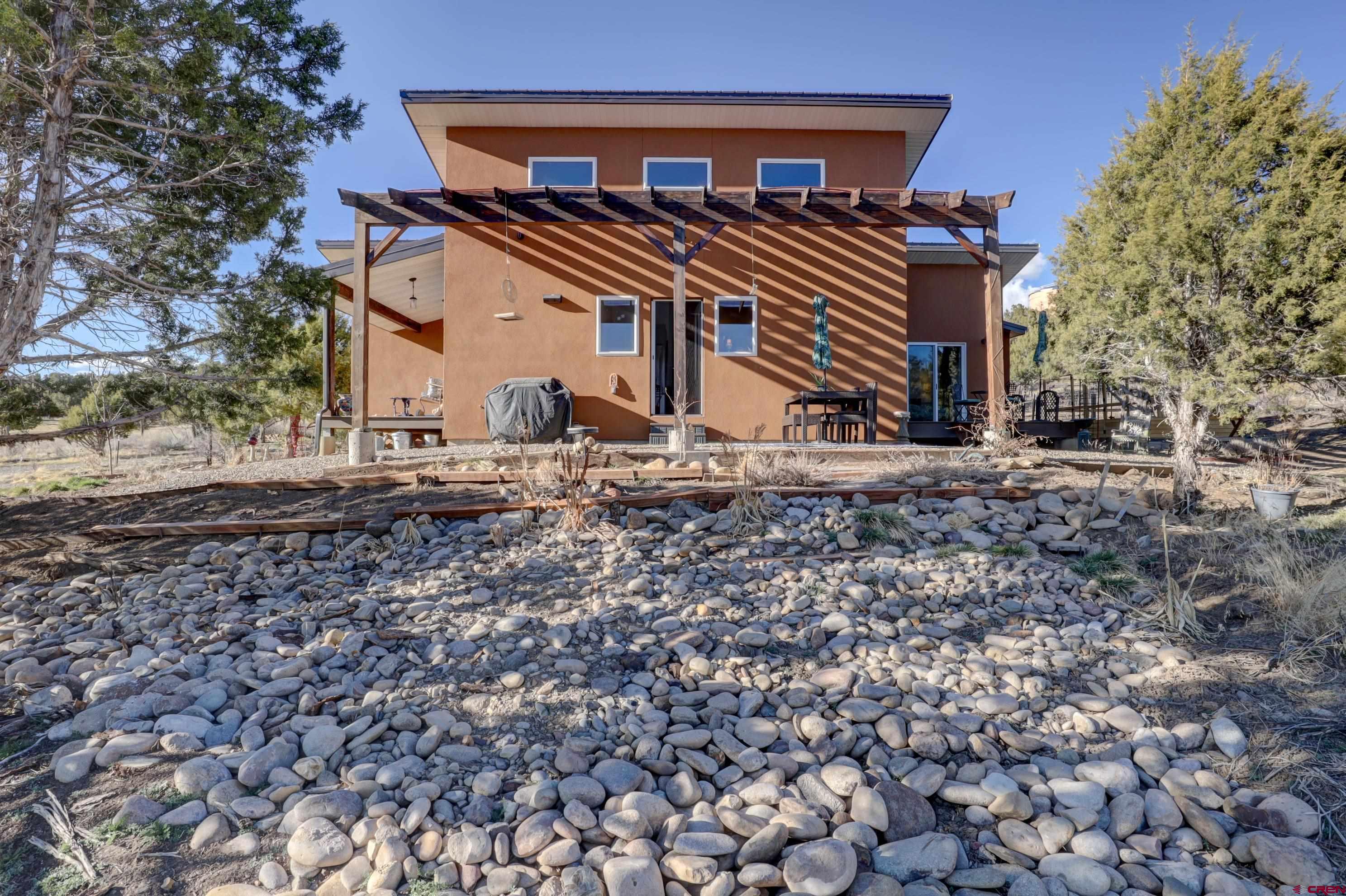 41839 Rd J.75 Mancos, CO 81328 - Photo 30 of 31 a view of a house with a yard