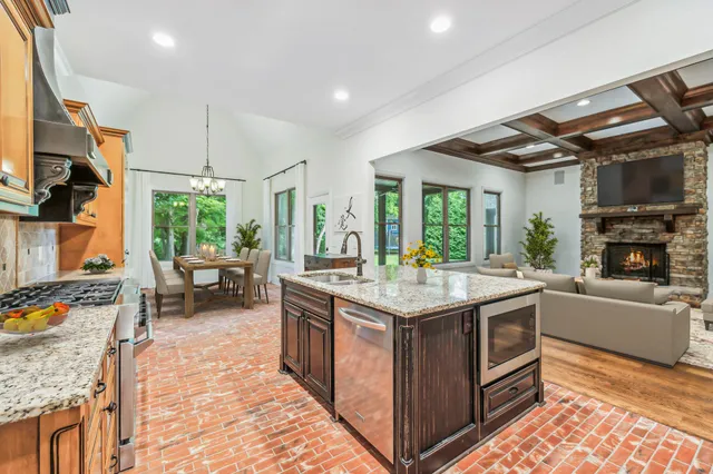 a kitchen with granite countertop lots of counter top space