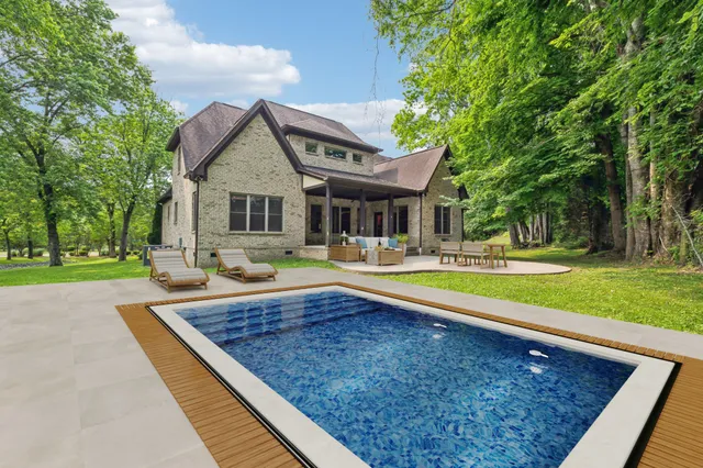 a view of outdoor space yard and swimming pool