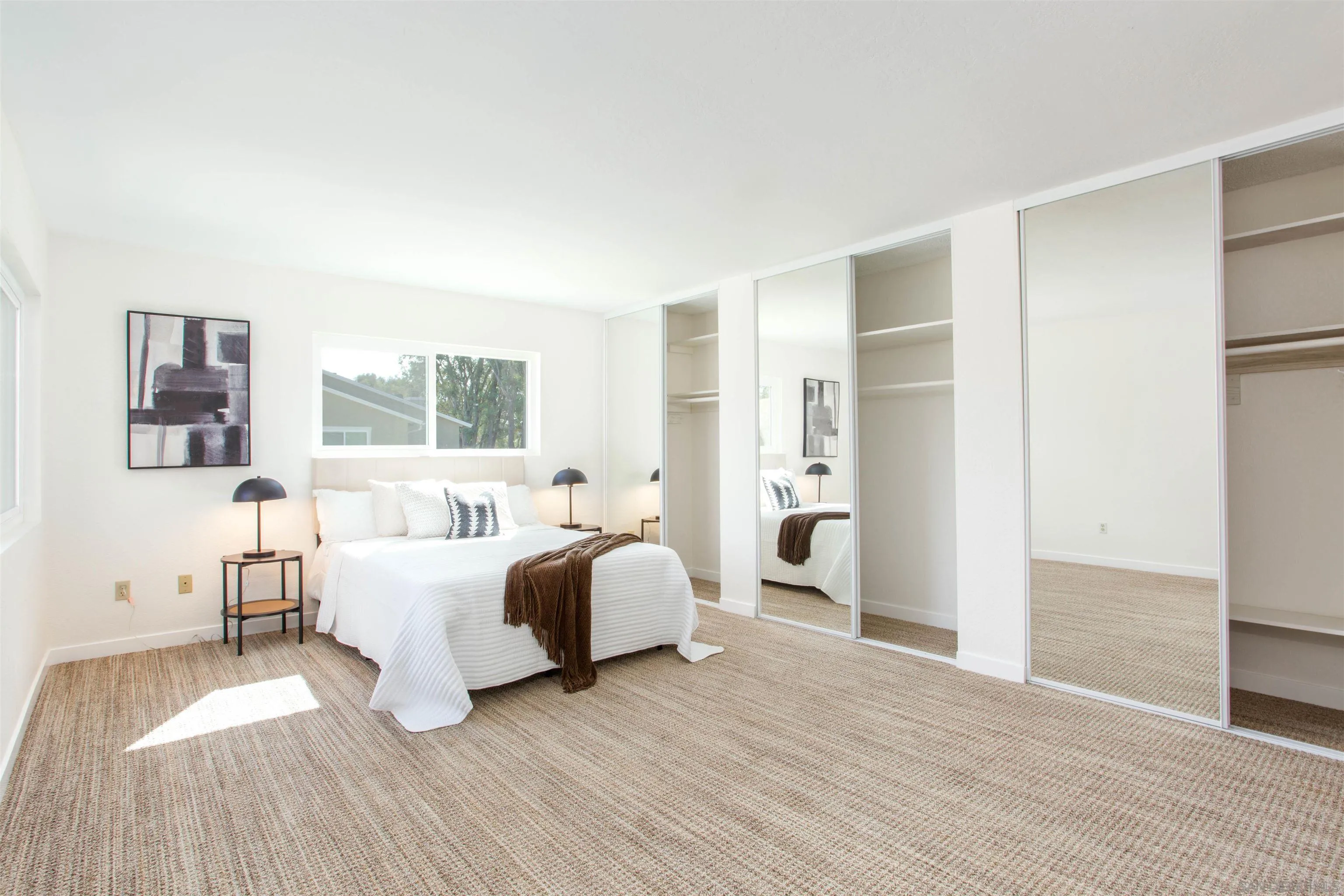 13650 Mulberry Tree Court Poway, CA 92064 - Photo 14 of 26 a bed room with a bed and a large window