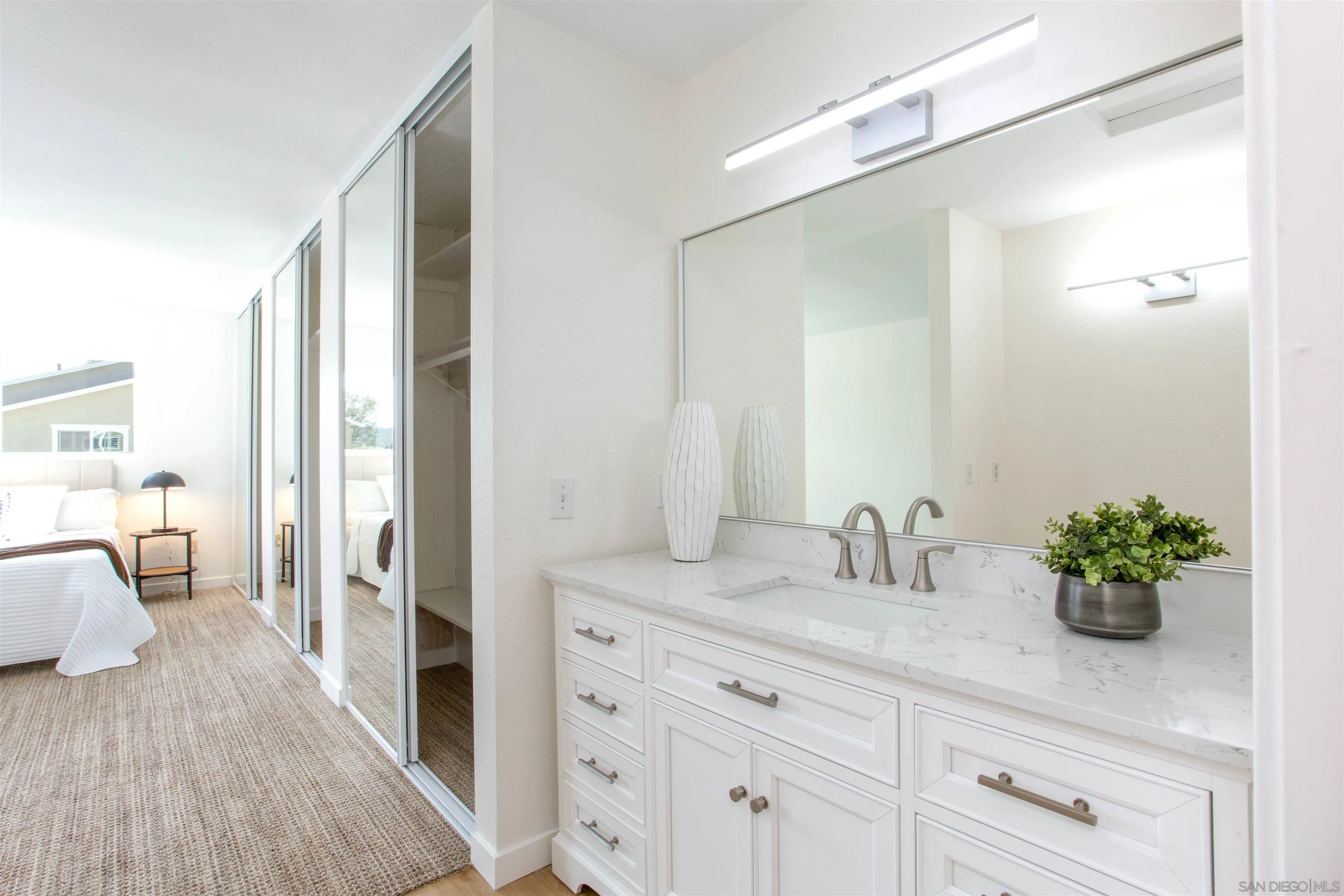 13650 Mulberry Tree Court Poway, CA 92064 - Photo 16 of 26 a en suite bathroom with a granite countertop sink