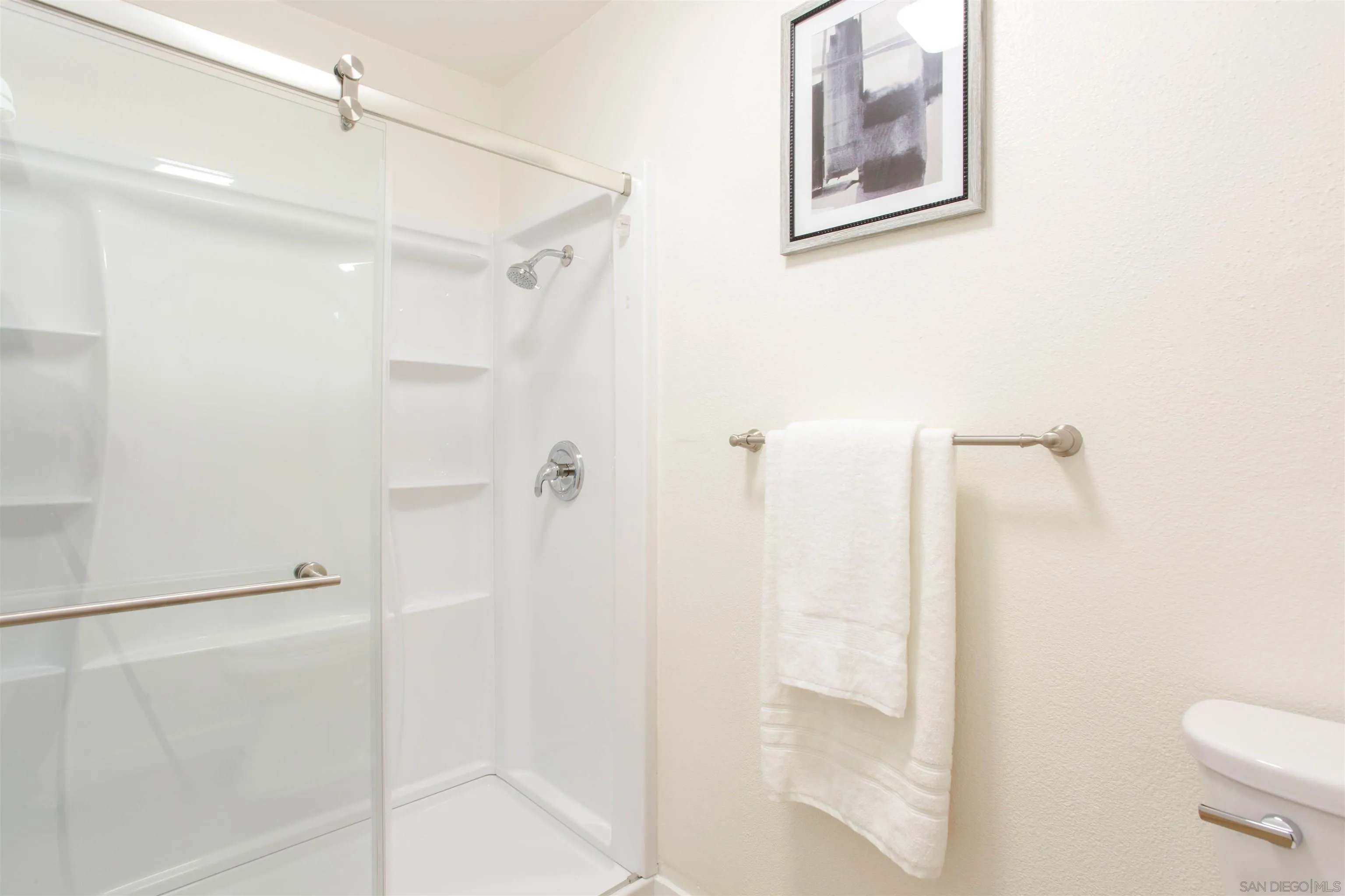 13650 Mulberry Tree Court Poway, CA 92064 - Photo 17 of 26 a bathroom with a shower and toilet