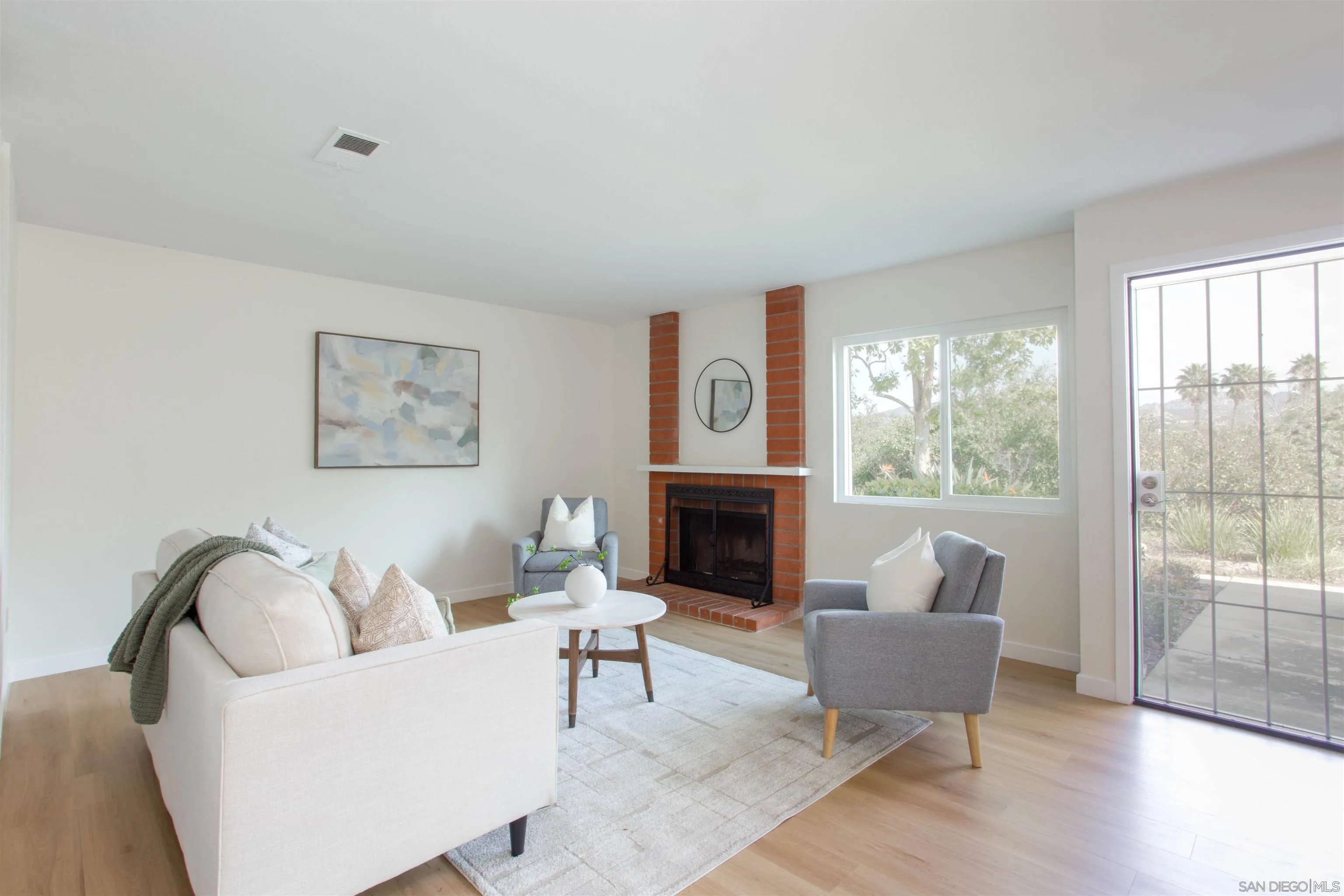 13650 Mulberry Tree Court Poway, CA 92064 - Photo 2 of 26 a living room with furniture and a fireplace