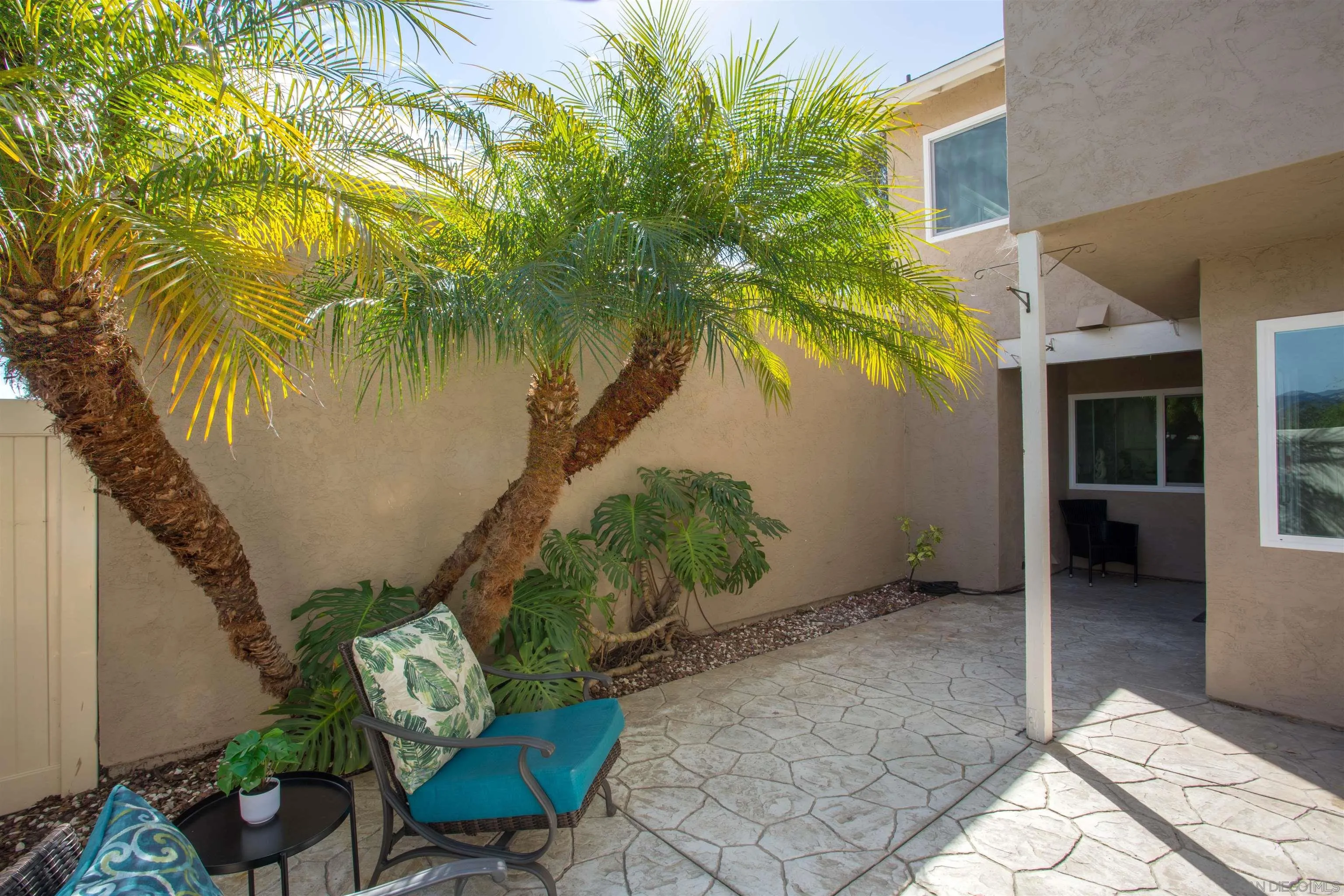 13650 Mulberry Tree Court Poway, CA 92064 - Photo 21 of 26 a backyard of a house with outdoor seating