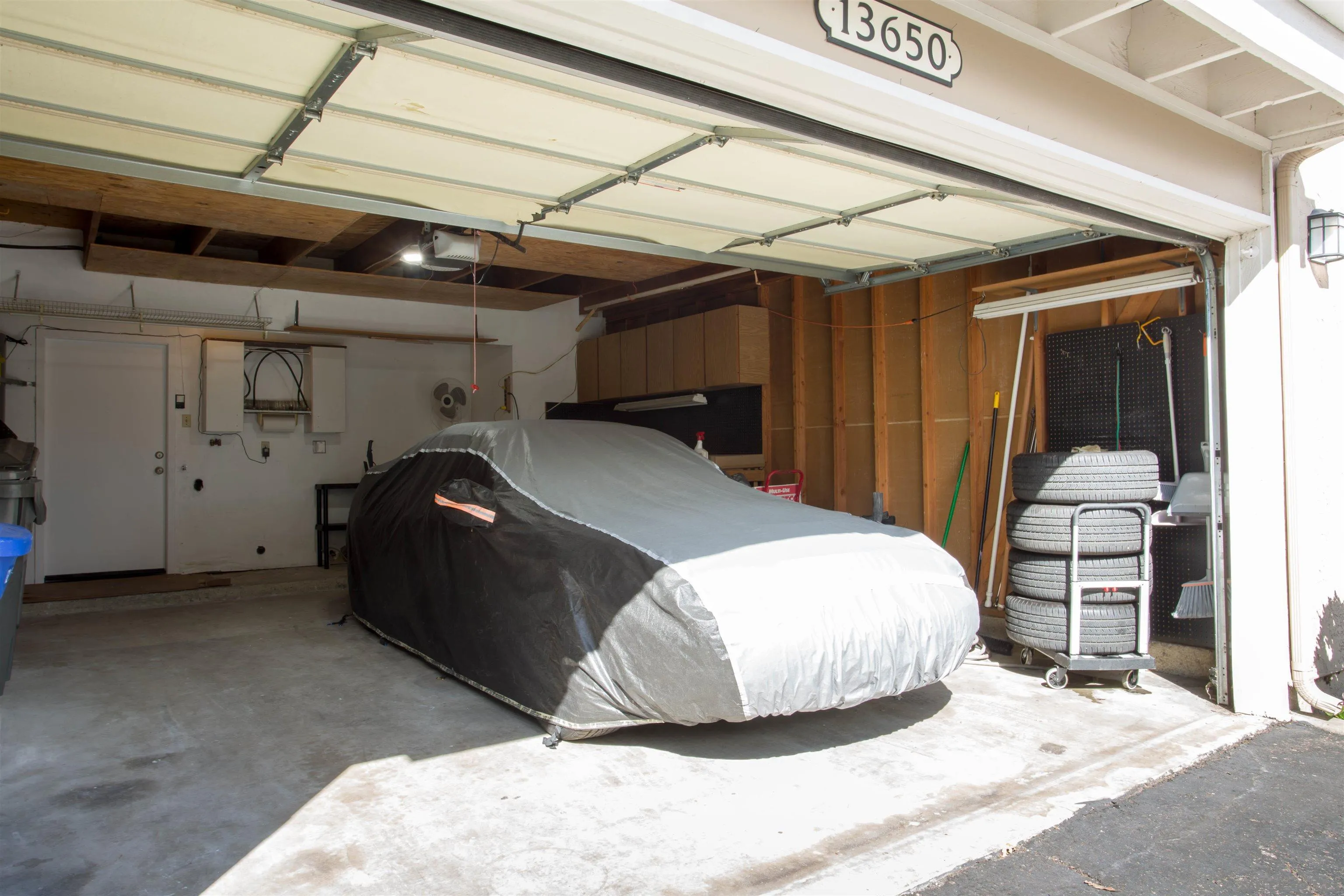 13650 Mulberry Tree Court Poway, CA 92064 - Photo 26 of 26 a bedroom with a bed and a mirror