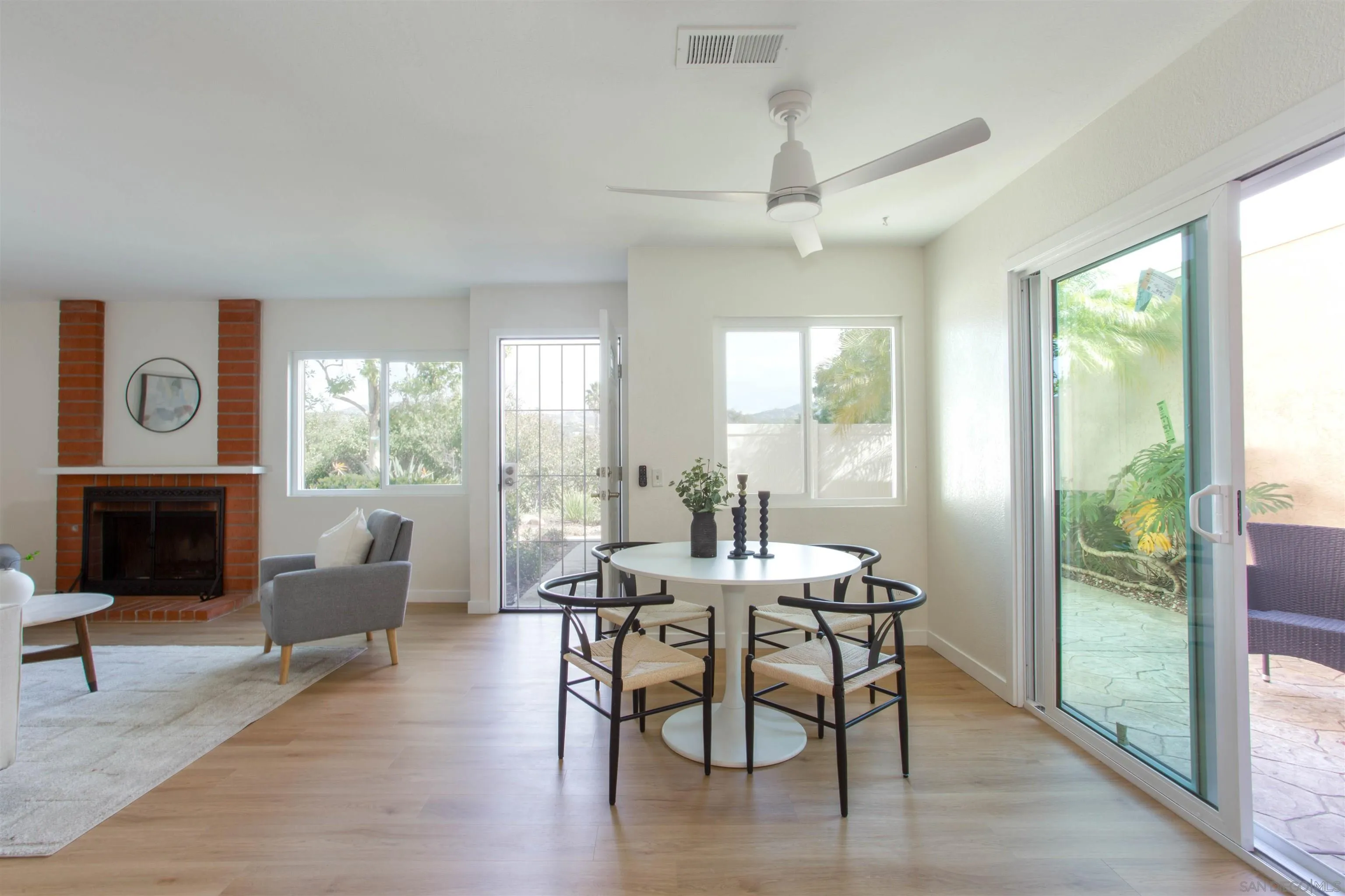 13650 Mulberry Tree Court Poway, CA 92064 - Photo 5 of 26 a view of a livingroom with furniture window and wooden floor