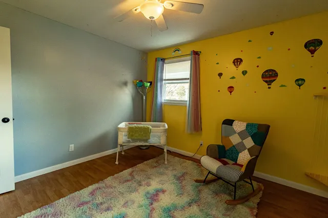 a view of a hallway with painted walls