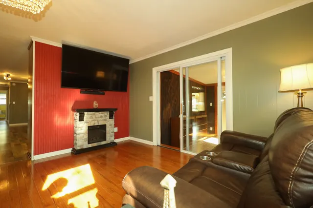 a view of a kitchen with a refrigerator
