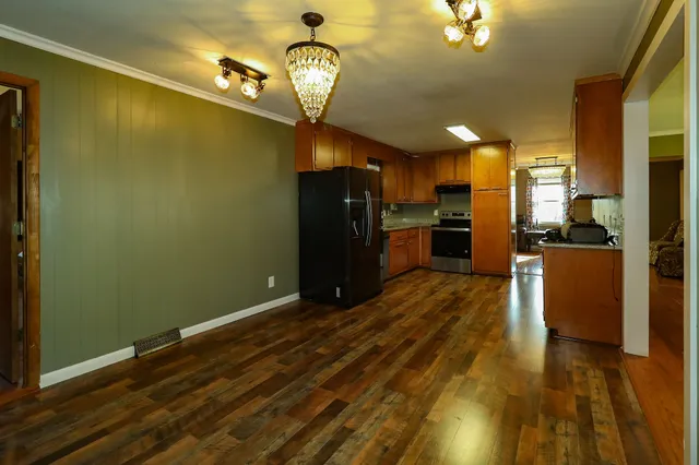 a view of entryway with a chandelier