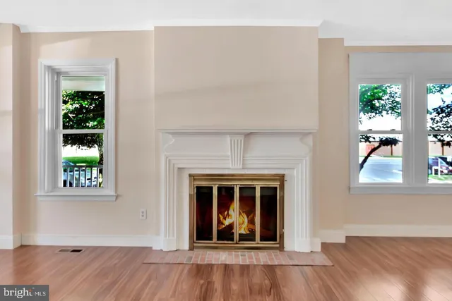 a view of interior space with wooden floor and stairs