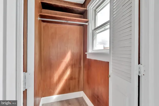 a view of yard from a corridor