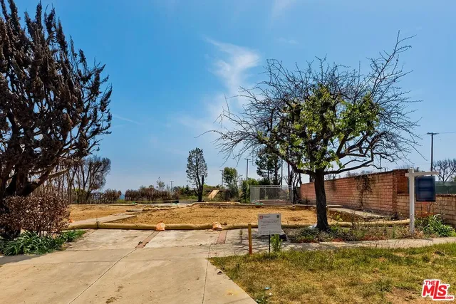 a view of swimming pool with trees