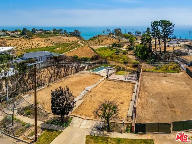 a view of a balcony with chairs
