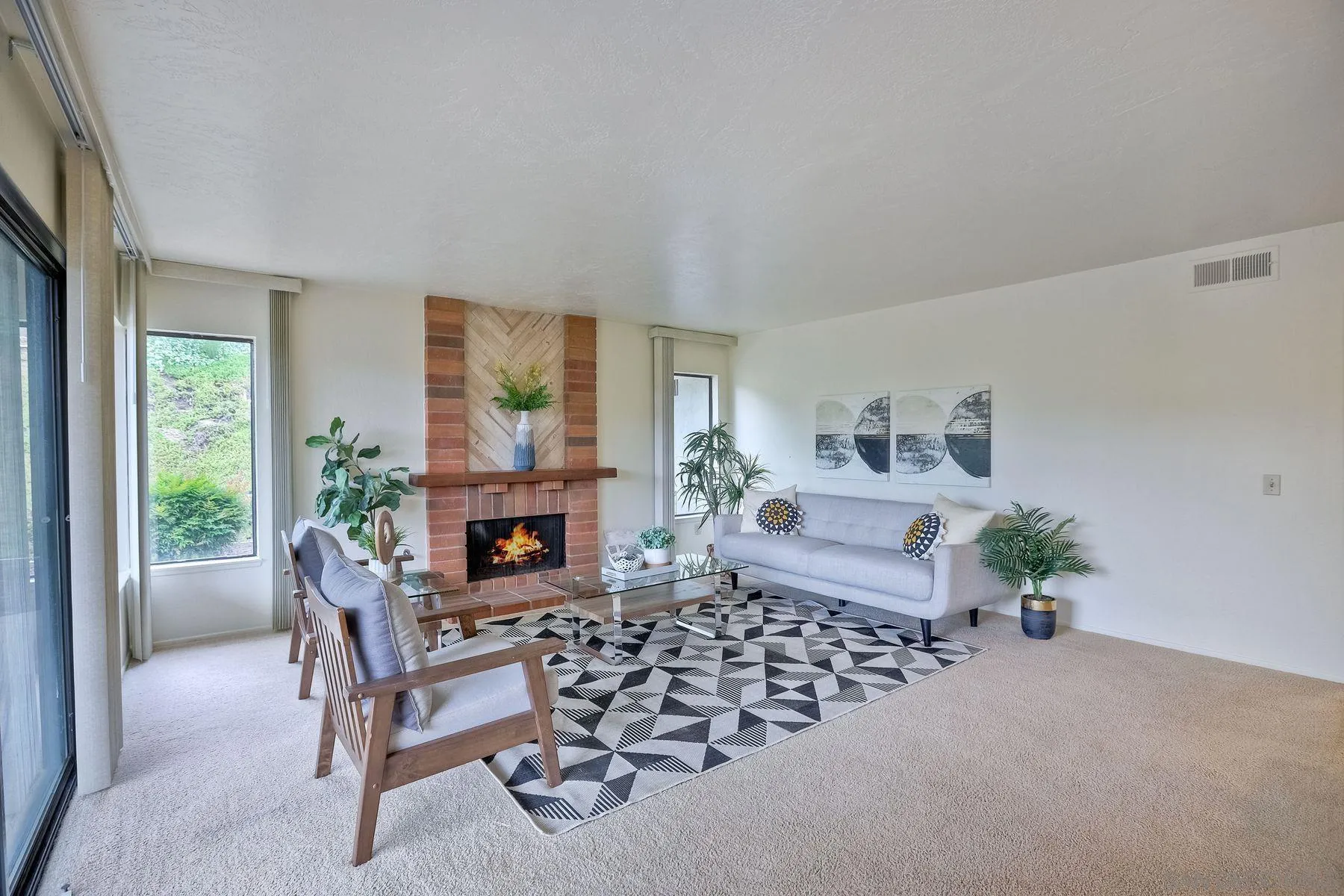 17834 St Andrews Drive Poway, CA 92064 - Photo 15 of 38 a living room with furniture a fireplace and a potted plant