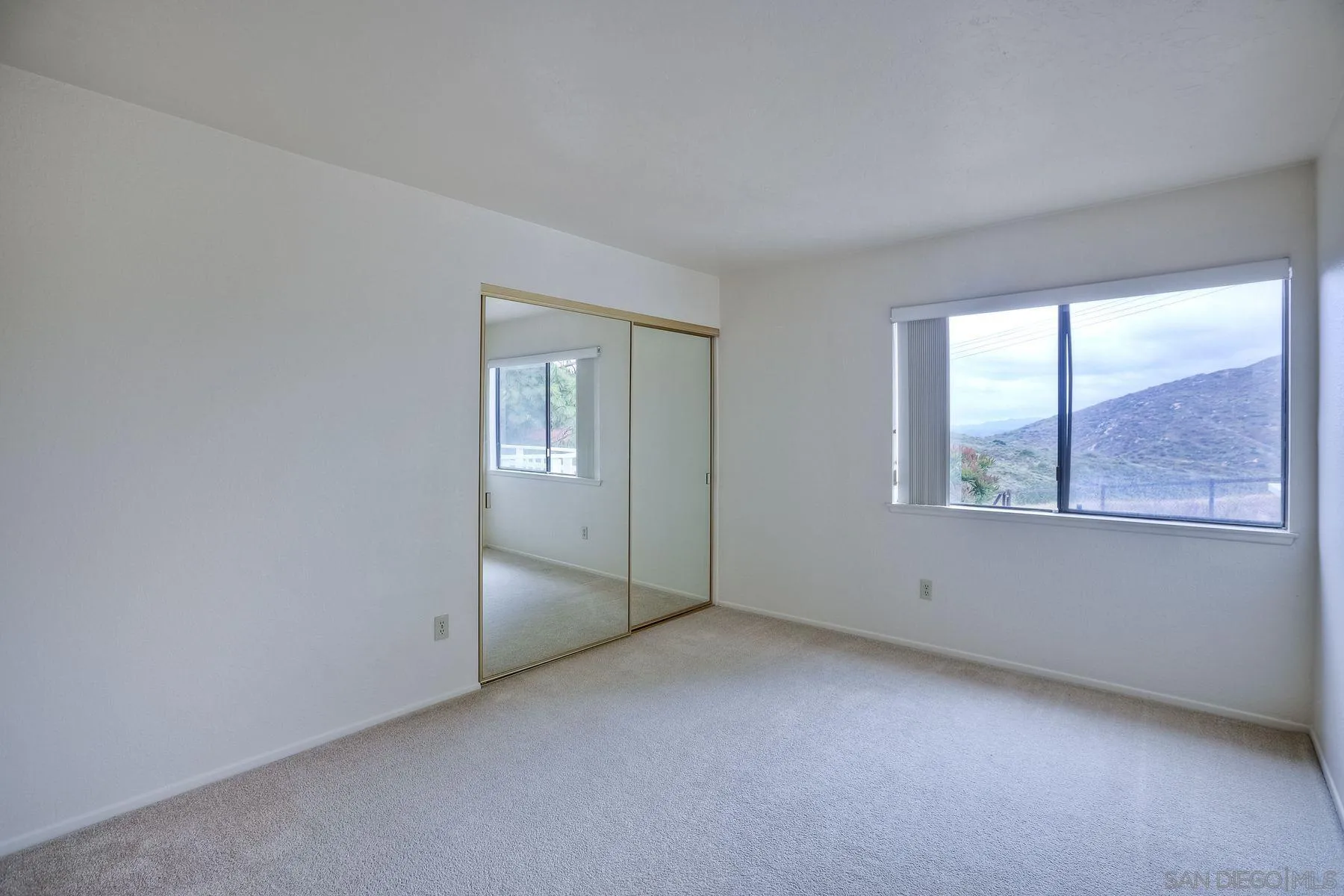 17834 St Andrews Drive Poway, CA 92064 - Photo 20 of 38 an empty room with windows and closet