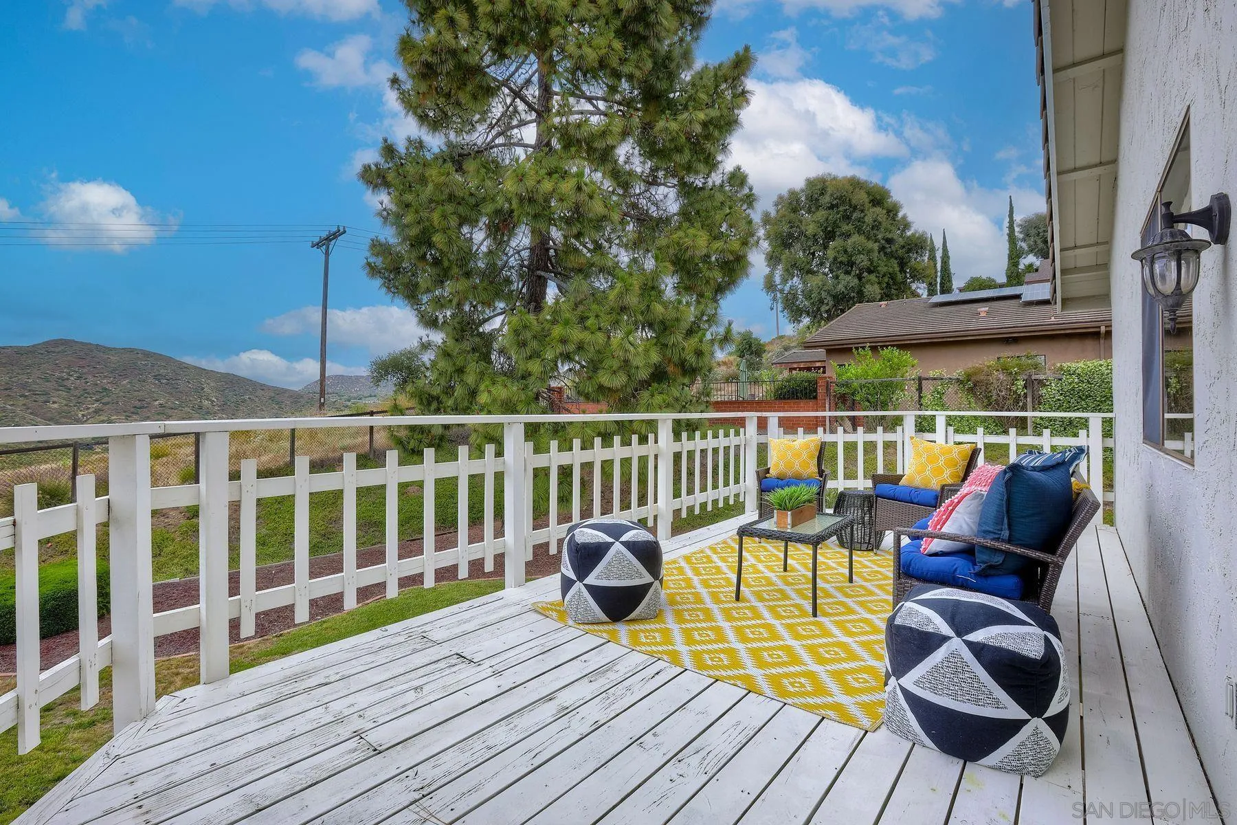 17834 St Andrews Drive Poway, CA 92064 - Photo 22 of 38 a view of balcony with furniture and wooden floor