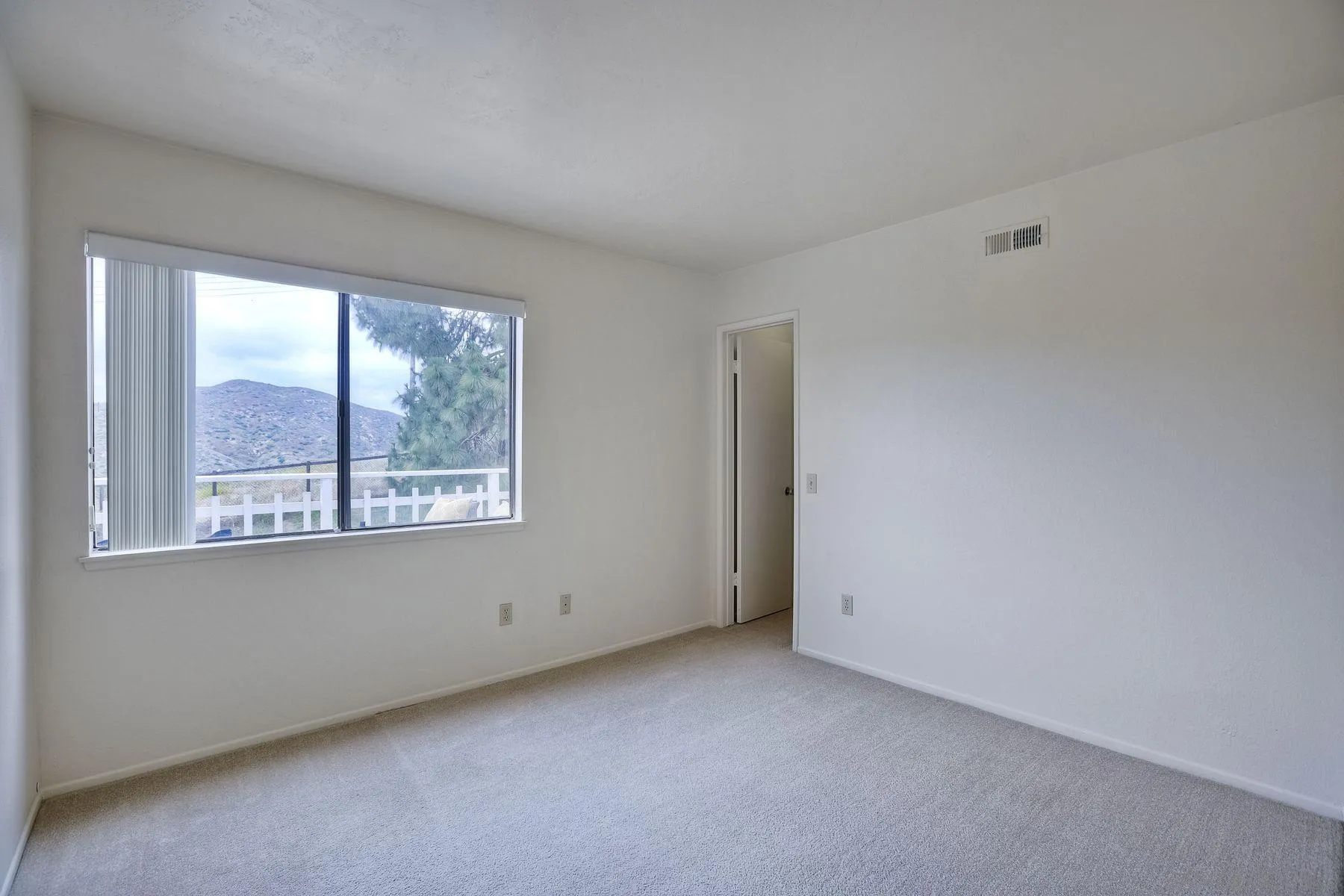 17834 St Andrews Drive Poway, CA 92064 - Photo 26 of 38 a view of an empty room with a window
