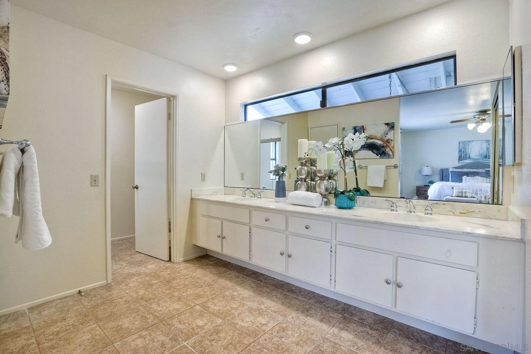 17834 St Andrews Drive Poway, CA 92064 - Photo 31 of 38 a spacious bathroom with a granite countertop sink mirror and double