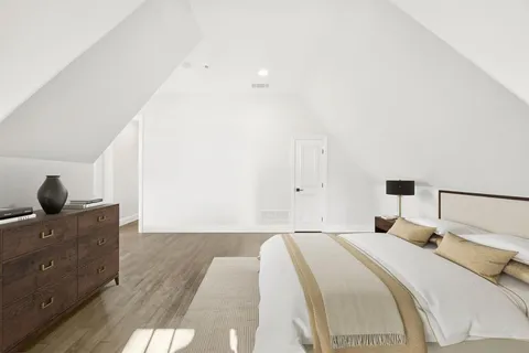 a kitchen with a sink a stove and cabinets