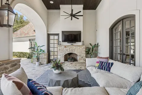 swimming pool view with a seating space