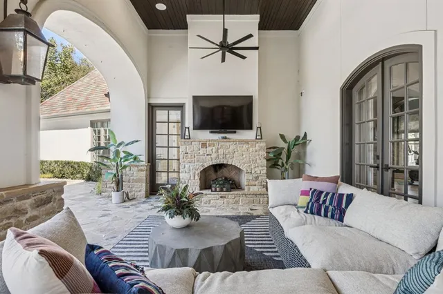 swimming pool view with a seating space