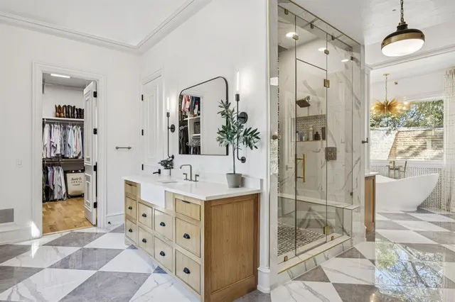 a white bath tub sitting in front of a window