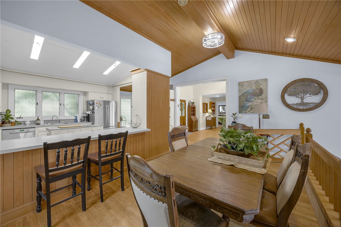 218 Northridge Drive Anderson, SC 29621 - Photo 7 of 50 Natural light illuminates this dining area, featuring vaulted ceilings and seamless kitchen access.