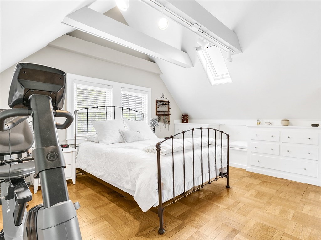4 Brier Road Boston, MA 02132 - Photo 29 of 34 a spacious bedroom with a bed and a window