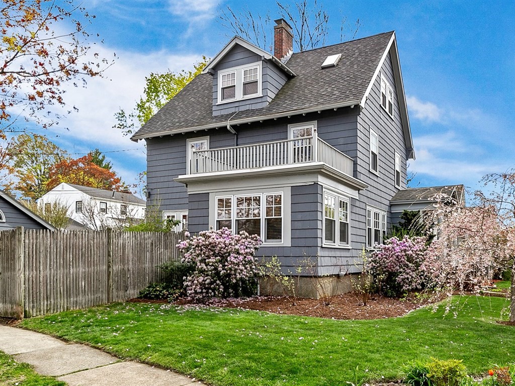 4 Brier Road Boston, MA 02132 - Photo 33 of 34 a front view of a house with a garden and plants