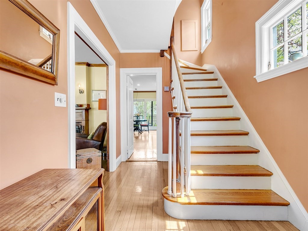 4 Brier Road Boston, MA 02132 - Photo 8 of 34 a view of entryway and hall with wooden floor