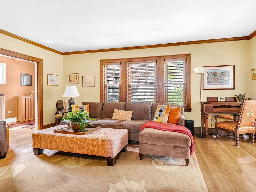 4 Brier Road Boston, MA 02132 - Photo 10 of 34 a living room with furniture and a large window