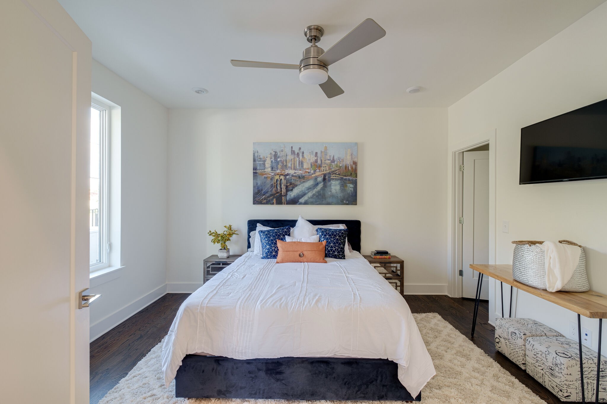 3746 Central Pike, Unit 13 Hermitage, TN 37076 - Photo 20 of 32 a bedroom with a bed and a flat screen tv