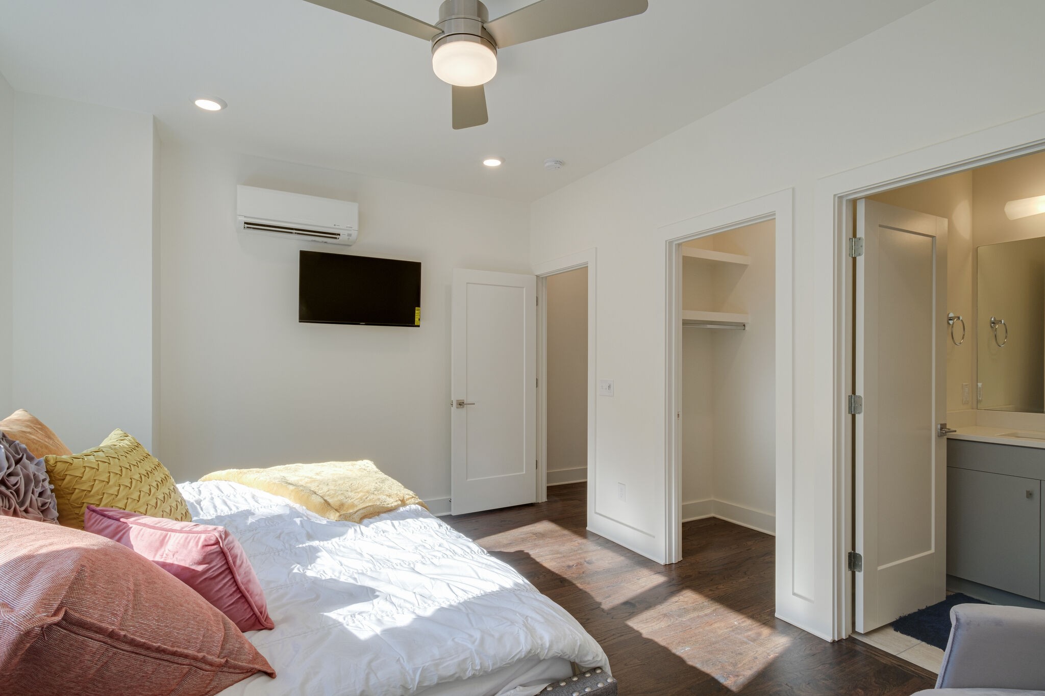 3746 Central Pike, Unit 13 Hermitage, TN 37076 - Photo 24 of 32 a bedroom with a bed and a flat screen tv