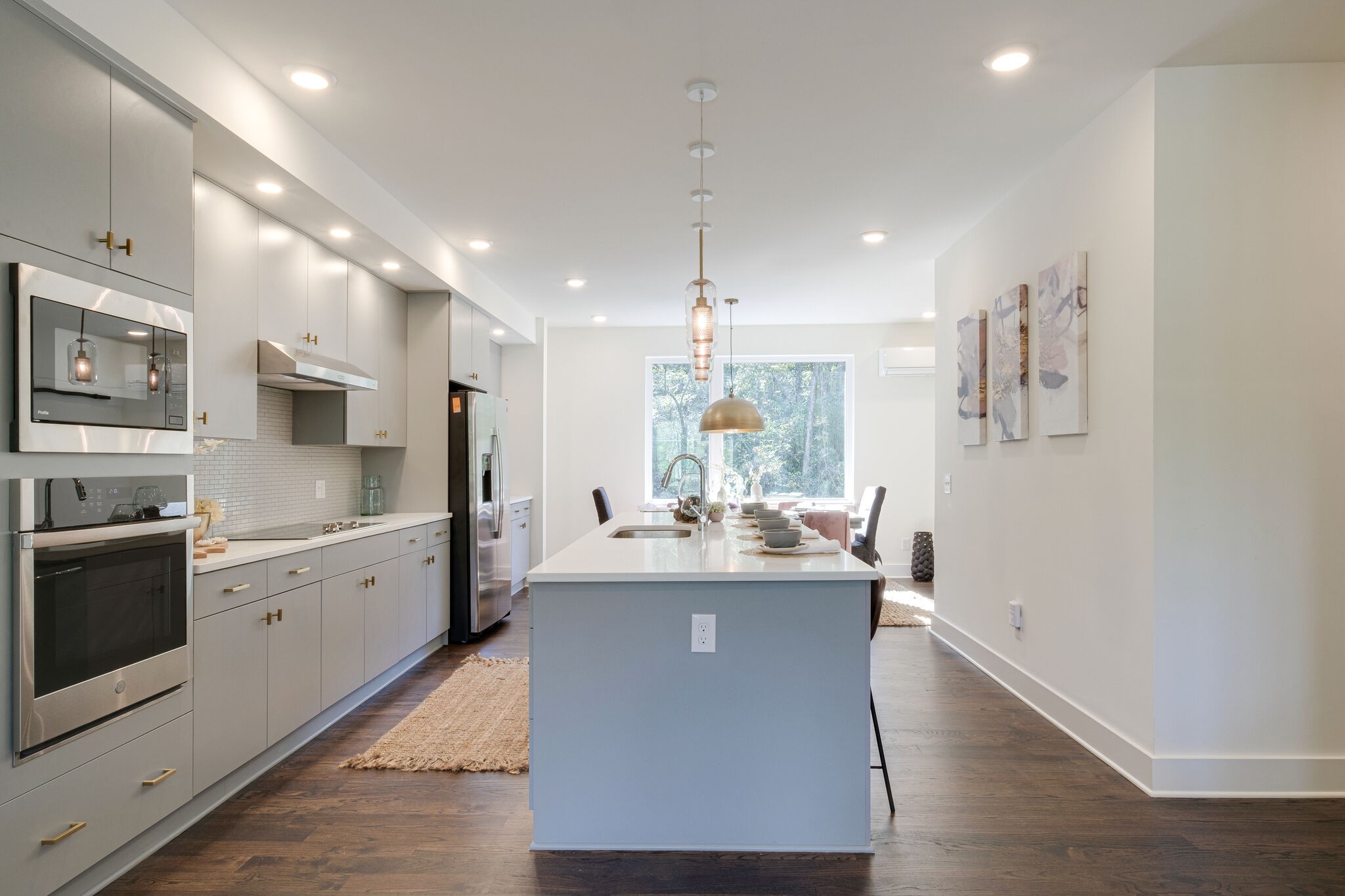 3746 Central Pike, Unit 13 Hermitage, TN 37076 - Photo 7 of 32 a kitchen with stainless steel appliances granite countertop a sink stove and refrigerator