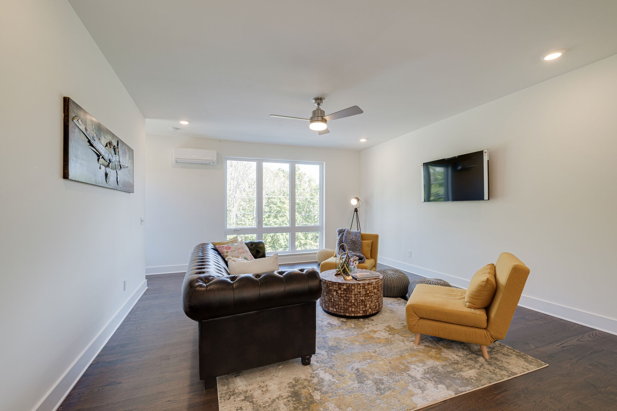 3746 Central Pike, Unit 13 Hermitage, TN 37076 - Photo 9 of 32 a living room with furniture and a flat screen tv