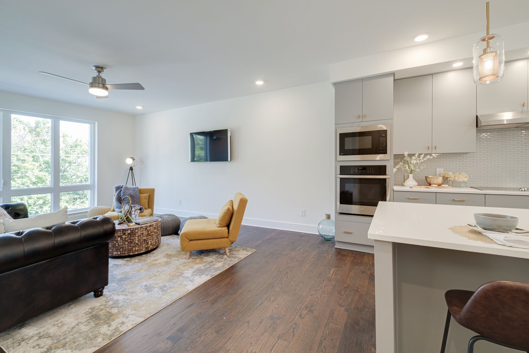 3746 Central Pike, Unit 13 Hermitage, TN 37076 - Photo 10 of 32 a living room with stainless steel appliances kitchen island granite countertop furniture and a large window