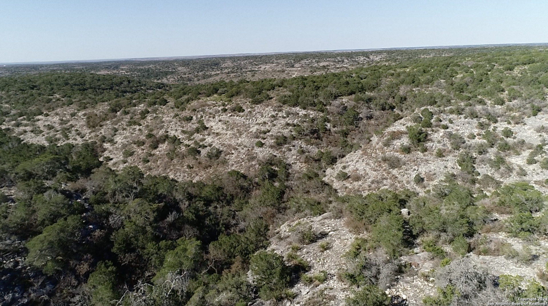 0 SD 63538 Del Rio, TX 78840 - Photo 6 of 27 an aerial view of residential houses with outdoor space and trees