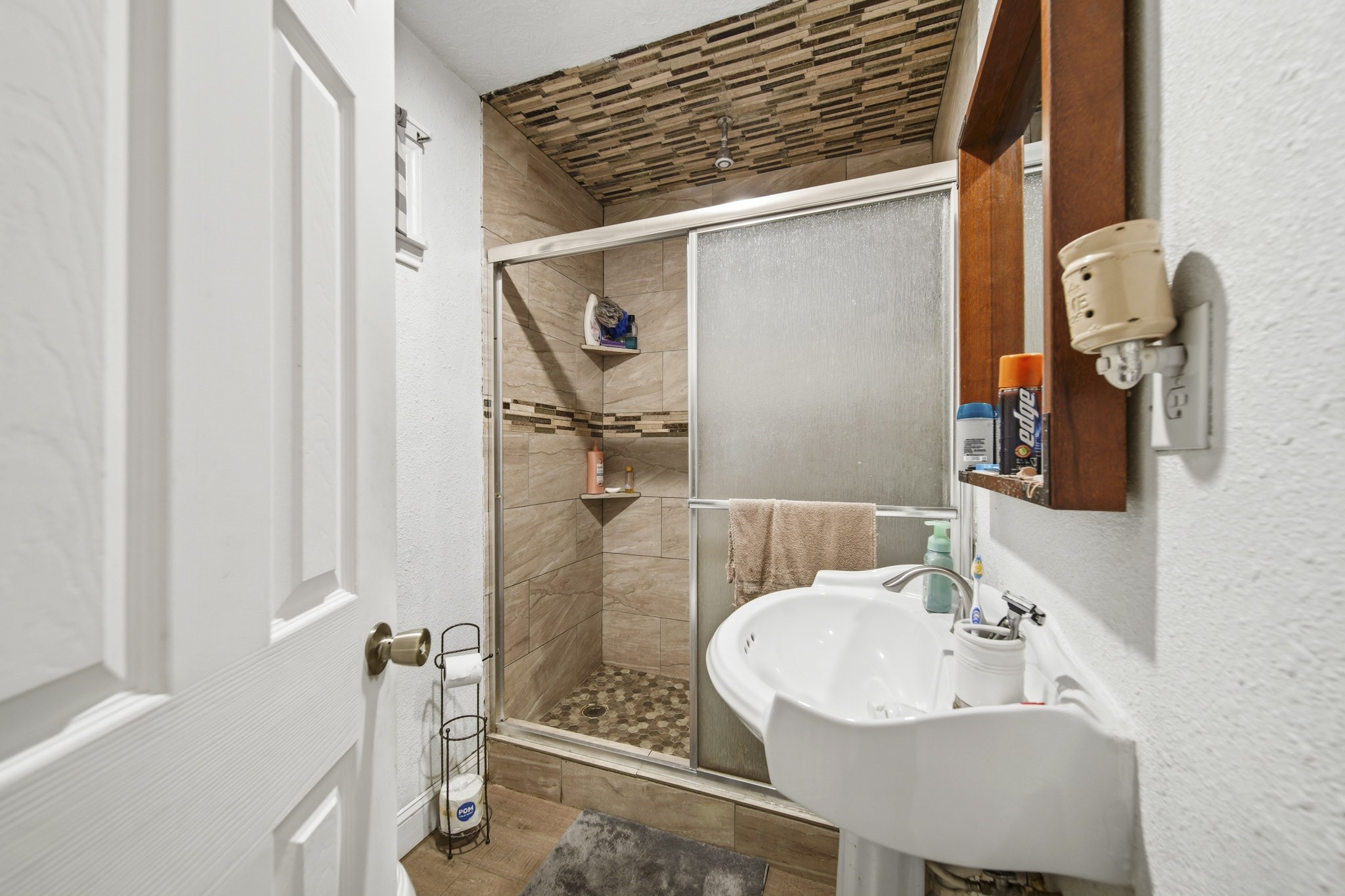 731 Meneley Road Winnie, TX 77665 - Photo 21 of 27 a bathroom with a sink and a mirror