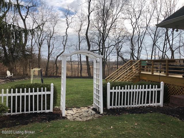 14032 Spring Mill Road Louisville, KY 40245 - Photo 36 of 42 Side yard leading into the backyard