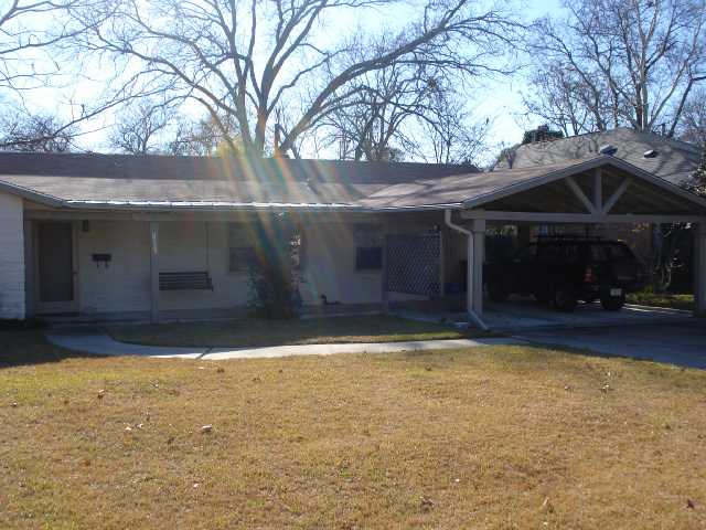 a view of house with outdoor space