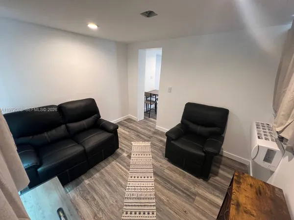 a living room with furniture and a couch