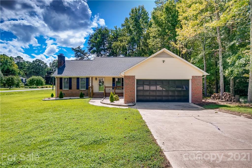 619 Breckenridge Road Kannapolis, NC 28083 - Photo 1 of 33 a front view of a house with swimming pool having outdoor seating
