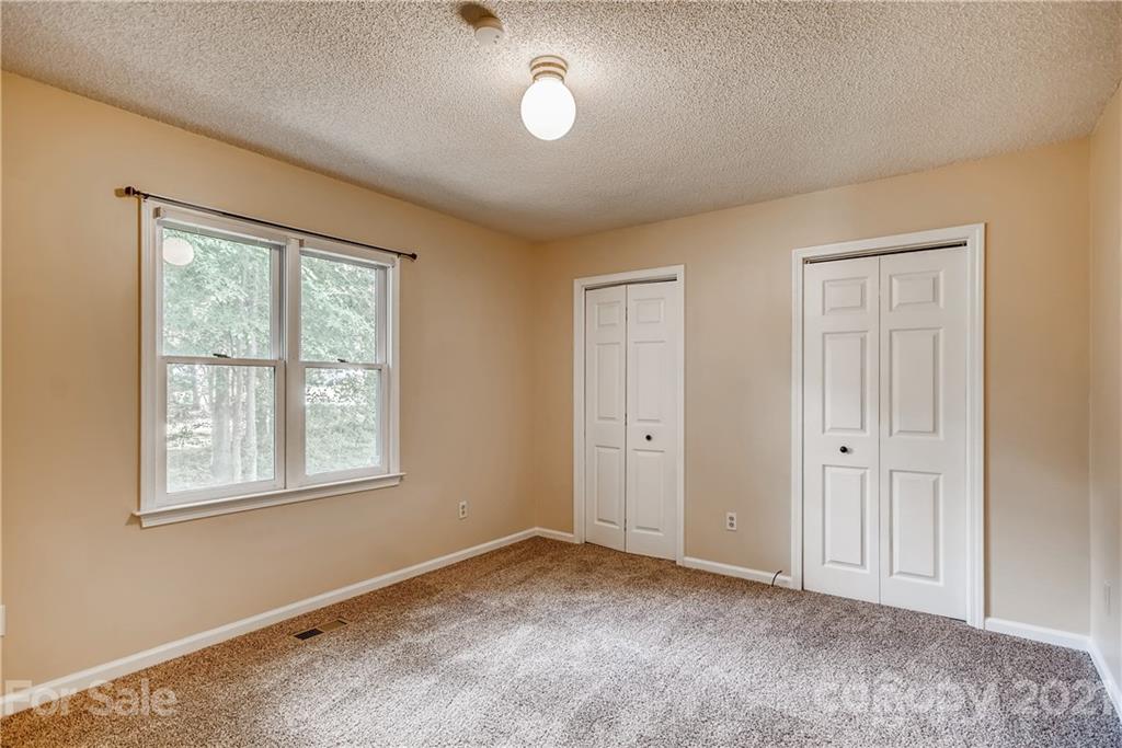 619 Breckenridge Road Kannapolis, NC 28083 - Photo 22 of 33 a view of an empty room with a window