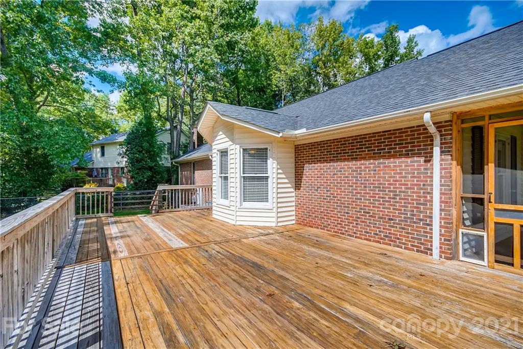 619 Breckenridge Road Kannapolis, NC 28083 - Photo 28 of 33 a view of house with backyard and deck