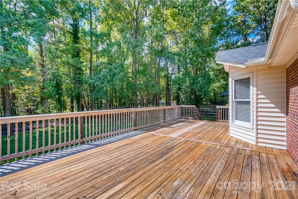 619 Breckenridge Road Kannapolis, NC 28083 - Photo 29 of 33 a view of backyard with a deck and wooden floor