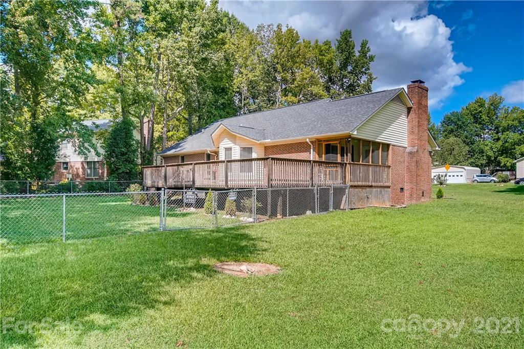 619 Breckenridge Road Kannapolis, NC 28083 - Photo 32 of 33 a view of a house with a backyard