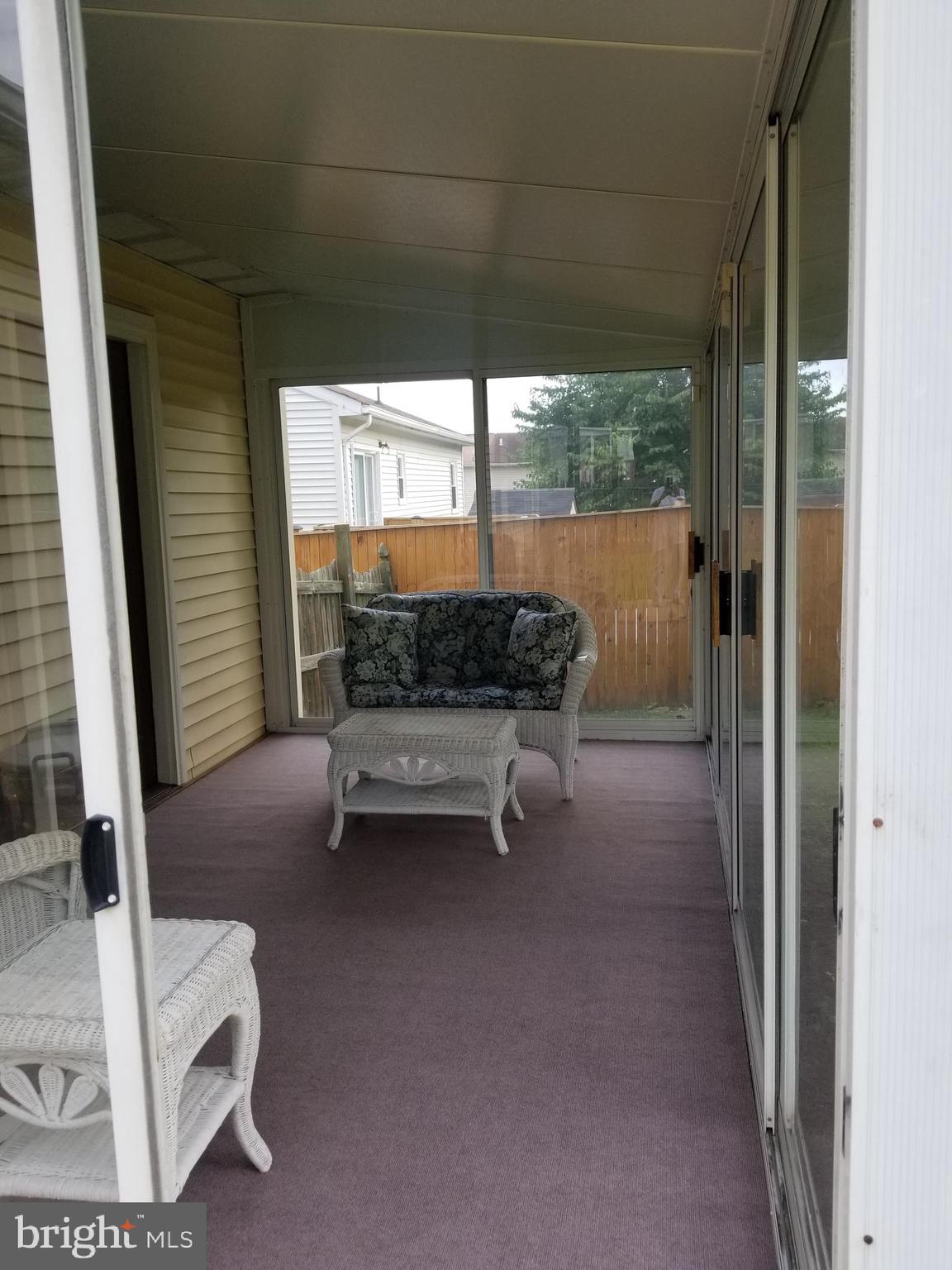 5752 Van Dyke Road Baltimore, MD 21206 - Photo 19 of 30 Cute sun room/ new carpeting