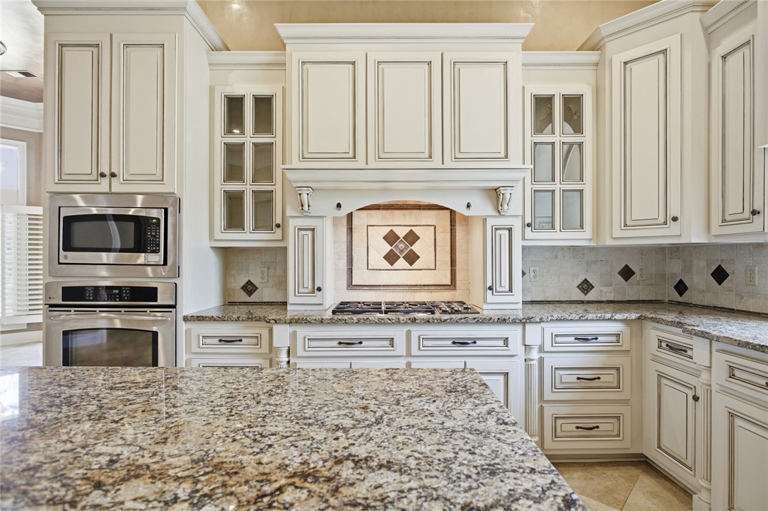 610 Highridge Drive Seneca, SC 29672 - Photo 16 of 50 This spacious kitchen features ample cabinetry and beautiful granite countertops, perfect for culinary endeavors.